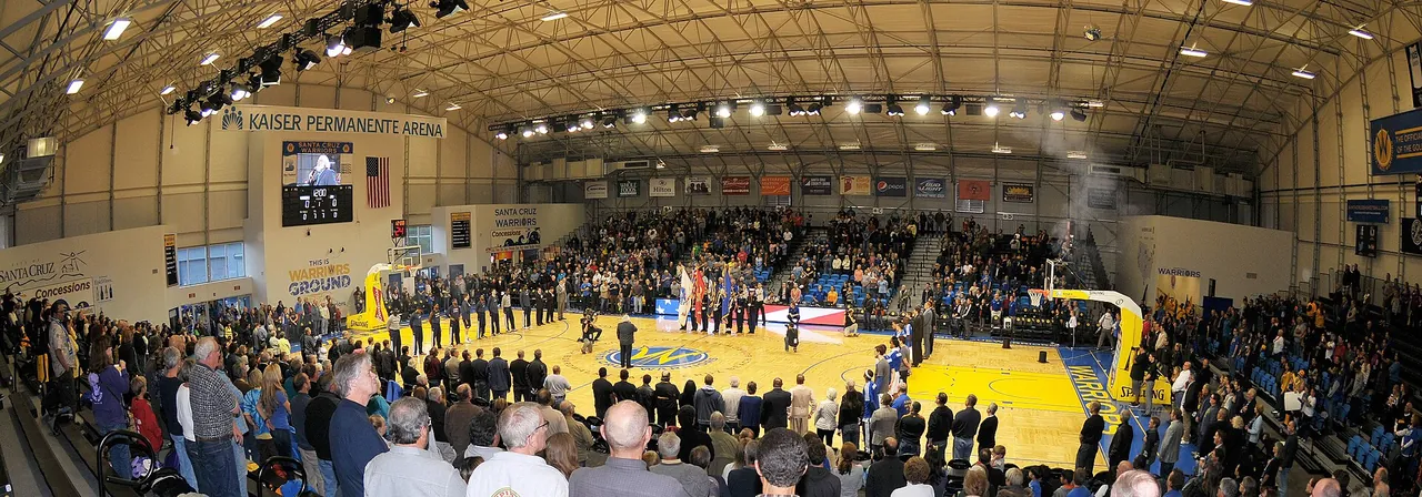 A full G League arena seen from the upper seats during a game