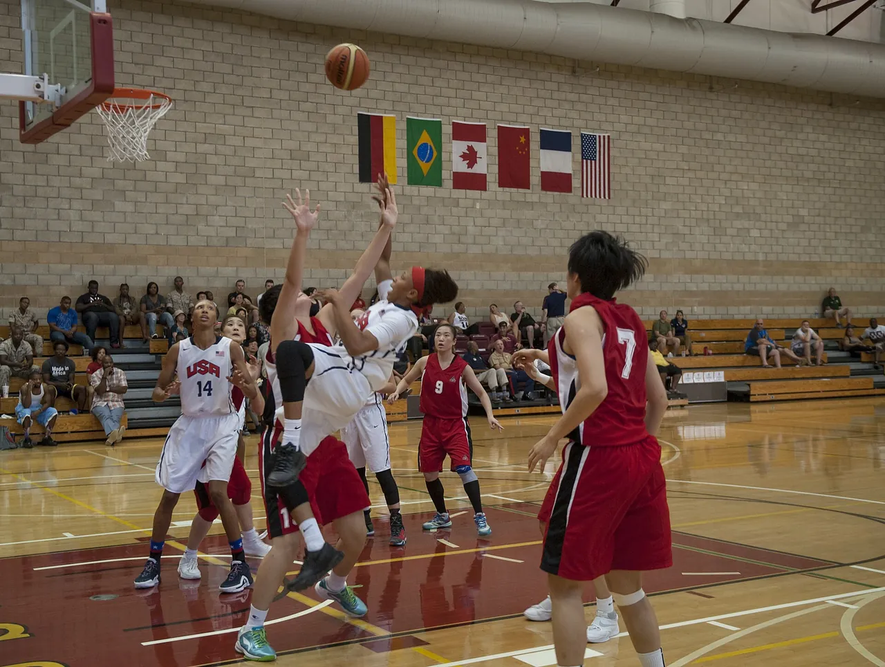Women's national teams play under national flags at an international tournament