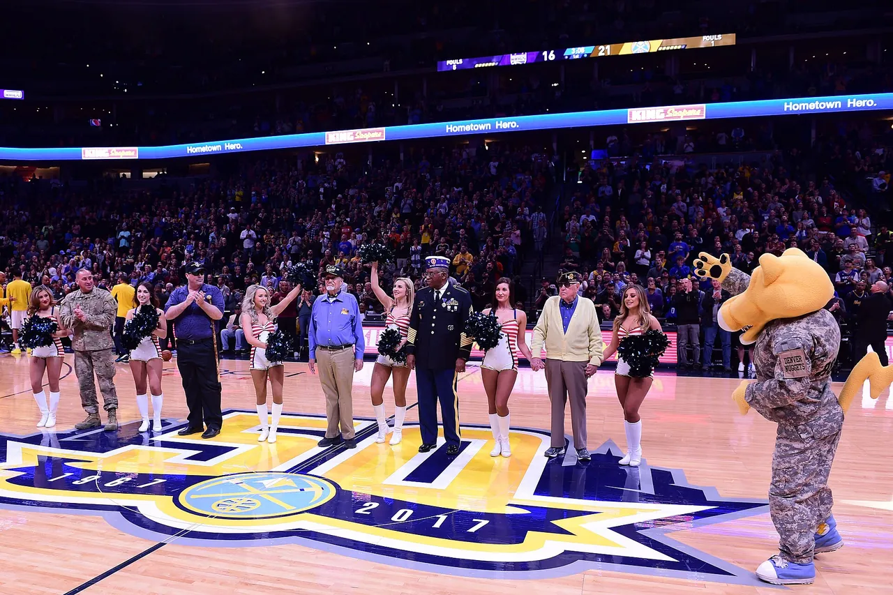 Center court of an NBA arena during a pregame ceremony