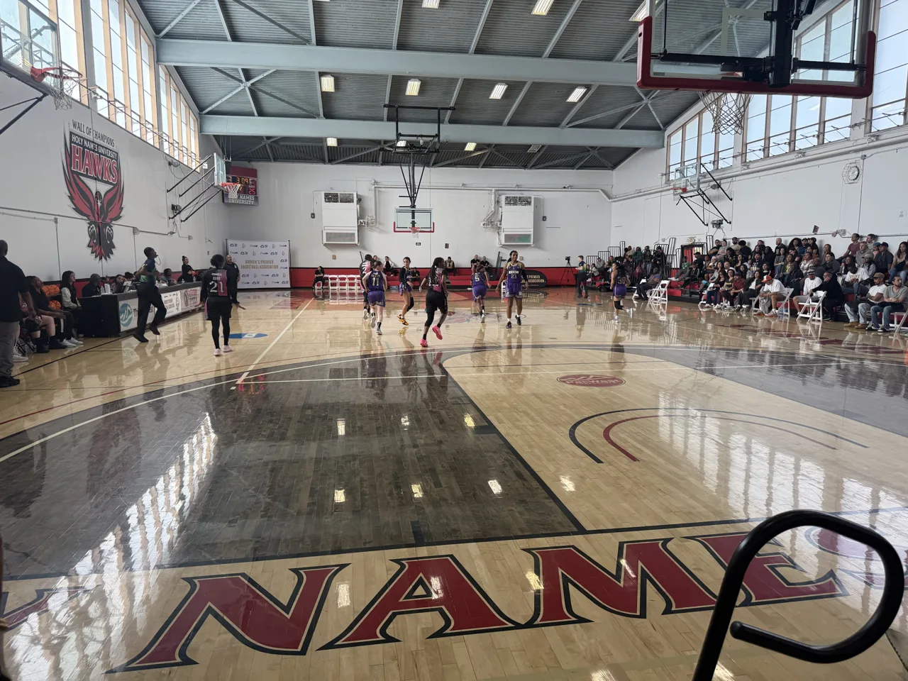 A Women’s Premier Basketball Association game in the Holy Names University gym in Oakland, with fans in the stands